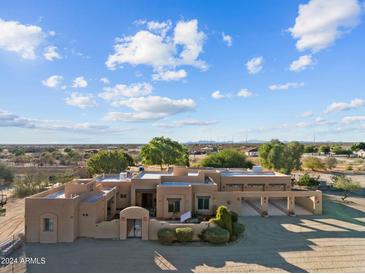 Single-story home with large garage, expansive desert views at 35916 N 213Th Dr, Wittmann, AZ 85361