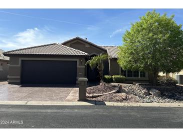 Single story home with a two car garage at 15075 W Amelia Dr, Goodyear, AZ 85395