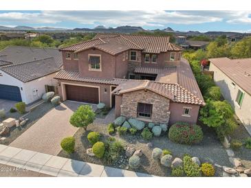 Two-story home with tile roof and landscaped yard at 27016 N 14Th Ln, Phoenix, AZ 85085