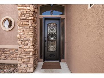 Ornate front door with stone accents welcomes you to this beautiful home at 568 N Falcon Dr, Gilbert, AZ 85234