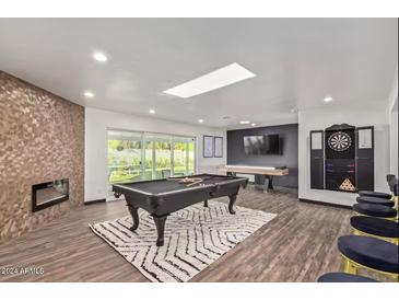 Game room features a pool table, dartboard, and shuffleboard at 6908 E Mariposa Dr, Scottsdale, AZ 85251