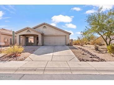 Charming single-story home with a two-car garage and well-manicured landscaping at 4657 E Matt Dillon Trl, Cave Creek, AZ 85331