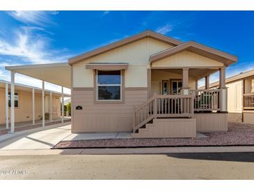 Charming single-wide manufactured home with covered carport at 9333 E University Dr # 58, Mesa, AZ 85207