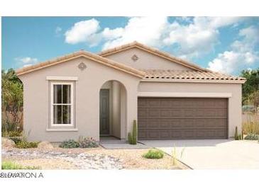 Single-story home with a brown garage door and Spanish-style accents at 18532 E Dario Rd, Gold Canyon, AZ 85118