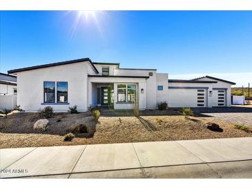 Stunning modern home with two-car garage and desert landscaping at 3329 W Desert Dawn Dr, Phoenix, AZ 85083