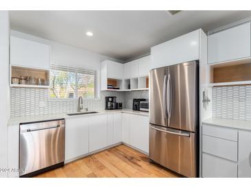 Modern kitchen with stainless steel appliances and contemporary cabinetry at 4701 N 68Th St # 144, Scottsdale, AZ 85251