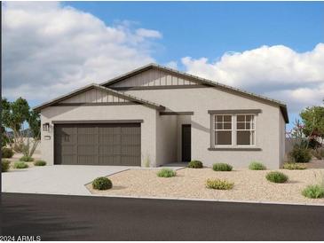 New construction home with a two-car garage at 46923 W Old Timer Rd, Maricopa, AZ 85139