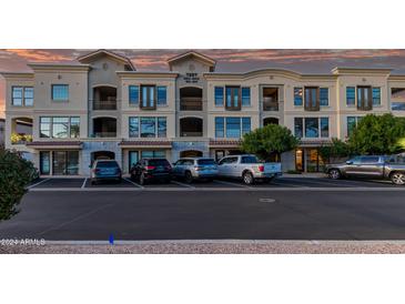 Three-story building with multiple units and parking at 7297 N Scottsdale Rd # 1004, Paradise Valley, AZ 85253