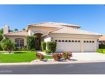 Beautiful two-story home with three car garage at 24426 S Ribbonwood Dr, Sun Lakes, AZ 85248