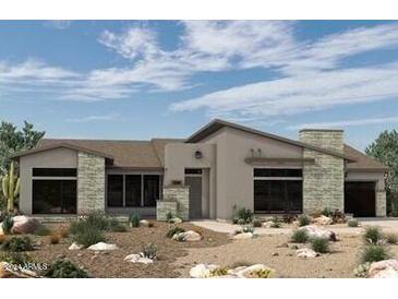Single-story home with stone accents and desert landscaping at 24450 N 132Nd Pl, Scottsdale, AZ 85255