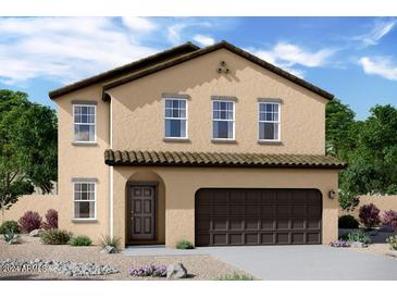 Two-story house with a two-car garage and desert landscaping at 20016 W Badgett Ln, Litchfield Park, AZ 85340