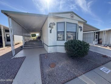 Single-wide manufactured home with carport at 4065 E University Dr # 503, Mesa, AZ 85205