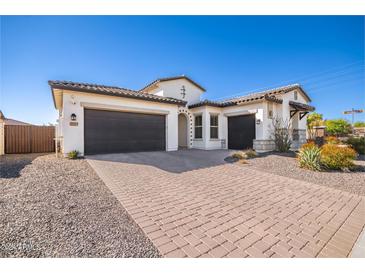 Two-story home with two car garage and attractive landscaping at 2053 E Scorpio Pl, Chandler, AZ 85249