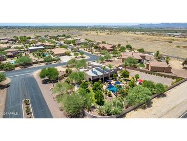 Aerial view showcasing house and neighborhood at 11305 S 195Th Dr, Buckeye, AZ 85326