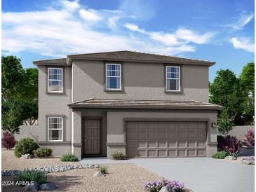 Two-story house with attached garage and desert landscaping at 3827 S 97Th Ave, Tolleson, AZ 85353