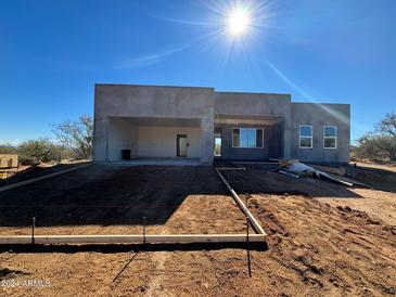 New construction home with a two-car garage at 16029 E Rancho Laredo Dr, Scottsdale, AZ 85262