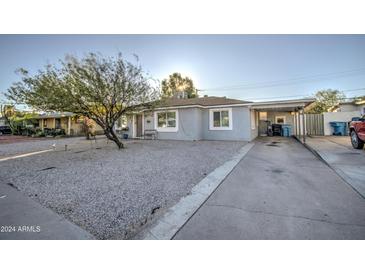 Charming single-story home with a well-maintained front yard and driveway at 8836 N 28Th Dr, Phoenix, AZ 85051