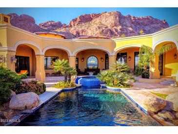 Expansive pool and patio area with mountain views at 4836 E White Gates Dr, Phoenix, AZ 85018