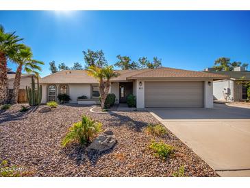 Ranch style home with desert landscaping at 813 W Diamond Dr, Tempe, AZ 85283