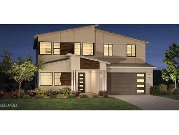 Two story modern home with gray siding and a two car garage at 6145 S Antonio --, Mesa, AZ 85212