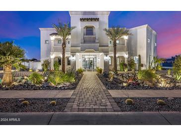Stunning two-story home with beautiful landscaping at 1480 E Raven Ct, Gilbert, AZ 85297