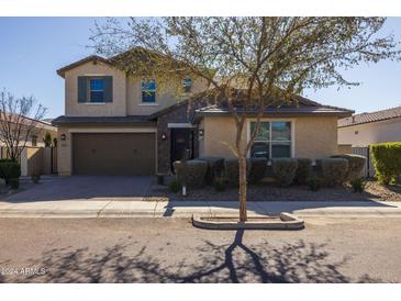 Two-story house with attached garage and landscaping at 9645 E Theia Dr, Mesa, AZ 85212