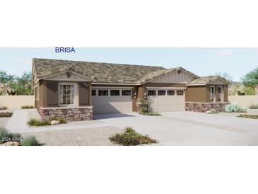 Modern craftsman style home with three car garage at 5640 N 205Th Ln, Buckeye, AZ 85396