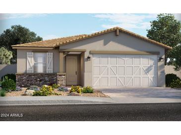 One-story home with two-car garage and landscaping at 5542 S 245Th Ln, Buckeye, AZ 85326