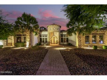 Elegant home with stone accents and a grand entrance at 2346 E Sanoque Ct, Gilbert, AZ 85298