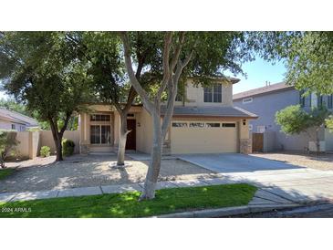 Two story house exterior with landscaping at 3473 E Bruce Ave, Gilbert, AZ 85234