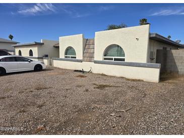 House exterior showcasing a clean and modern design at 1202 E Delano Dr, Casa Grande, AZ 85122