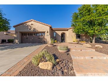 Single-story home with desert landscaping and two-car garage at 12832 W Pinnacle Vista Dr, Peoria, AZ 85383