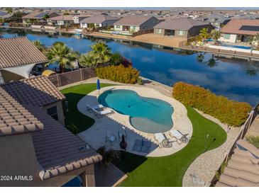 Luxury home with private pool and canal access at 40748 W Chambers Dr, Maricopa, AZ 85138