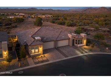 Luxury two-car garage home with desert landscape views at 18332 E Spring Valley Ct, Rio Verde, AZ 85263