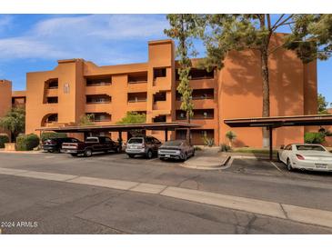 Two-story building with parking and landscaping at 12212 N Paradise Village S Pkwy # 413, Phoenix, AZ 85032