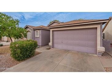 Attached two-car garage with a spacious driveway at 1812 E Peach Tree Dr, Chandler, AZ 85249