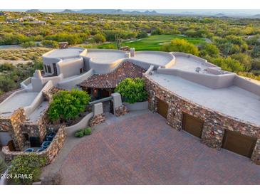 Luxury home with unique architecture, expansive grounds, and stunning desert views at 41731 N Stone Cutter Dr, Scottsdale, AZ 85262