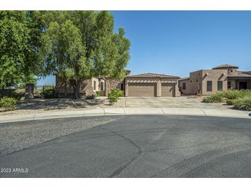 Beautiful home with three-car garage and mature landscaping at 1820 W Magdalena Ln, Phoenix, AZ 85041