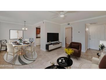 Bright dining area with table and chairs, view into living room and kitchen at 8260 E Arabian Trl # 151, Scottsdale, AZ 85258