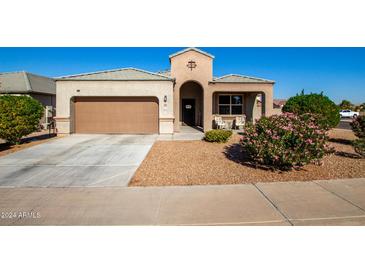 One-story house with a two-car garage and landscaped front yard at 2826 W Hidalgo Ave, Phoenix, AZ 85041