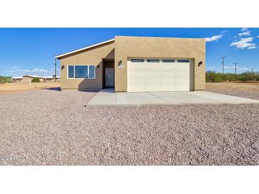 New construction home with a large yard and attached garage at 4145 N Golden St, Eloy, AZ 85131