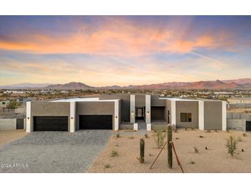 Stunning modern home with mountain views, two-car garage, and landscaped front yard at 256 E Tumbleweed Dr, Phoenix, AZ 85085