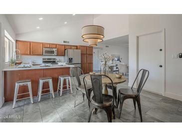 Bright kitchen features modern appliances and ample cabinetry at 3449 W Muriel Dr, Phoenix, AZ 85053