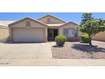 One-story house with a two-car garage and landscaped front yard at 11189 W El Caminito Dr, Peoria, AZ 85345