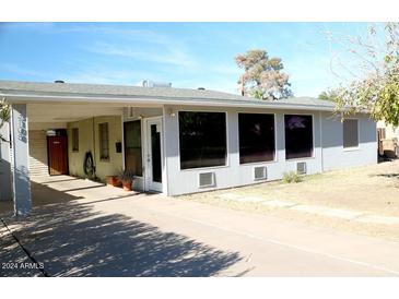 Ranch style home with carport and large windows at 3108 N 26Th Pl, Phoenix, AZ 85016