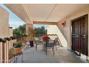 Spacious patio with seating area, perfect for outdoor dining at 9355 N 91St St # 234, Scottsdale, AZ 85258