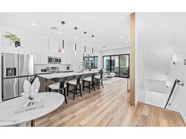 Modern kitchen with stainless steel appliances and island at 4220 N 32Nd St # 3, Phoenix, AZ 85018