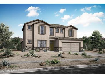 Two-story house with stone accents and a three-car garage at 34504 N Timberlake Mnr, San Tan Valley, AZ 85144