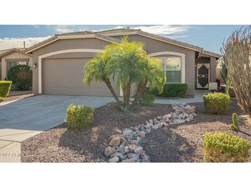 Single-story home with desert landscaping and two-car garage at 3409 E Hazeltine Way, Chandler, AZ 85249