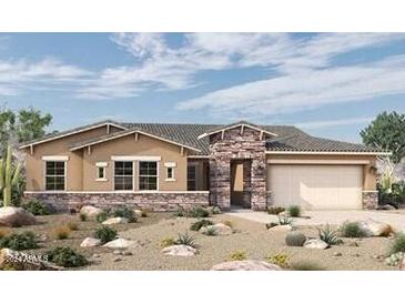 Single-story home with stone accents and desert landscaping at 20241 W San Miguel Ave, Litchfield Park, AZ 85340